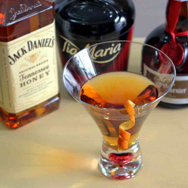 Jack's Grand Ball drink recipe featuring Jack Honey, Grand Marnier and Tia Maria.