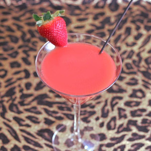 The Strawberry Sombrero cocktail blends the flavors of coffee, milk and strawberry. The richness of the milk - and I do recommend using whole milk - dilutes the sweetness of the liqueur and fruit syrup.