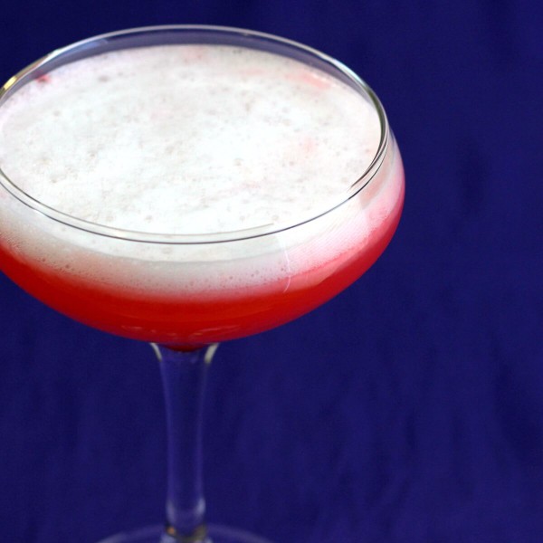 The Royal Clover Club Cocktail has a flavor that's all citrus and berry, but with a creamy, silky texture. That's because it uses an egg yolk, which adds very little flavor, but some definite body.